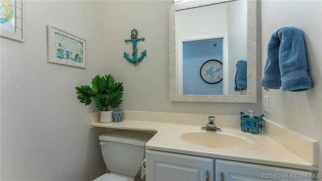 611 Lazy Days Rd Unit L5, Osage Beach, MO 65065 - half bathroom featuring toilet and vanity