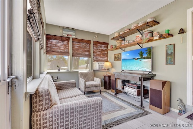 living room featuring baseboards