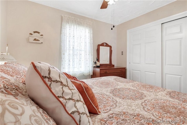bedroom with a closet and a ceiling fan