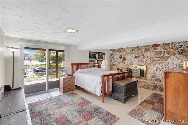 tiled bedroom with access to exterior