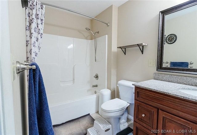bathroom with toilet, shower / bath combo, and vanity