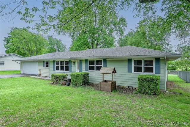 ranch-style home featuring a front lawn, driveway, a garage, and fence