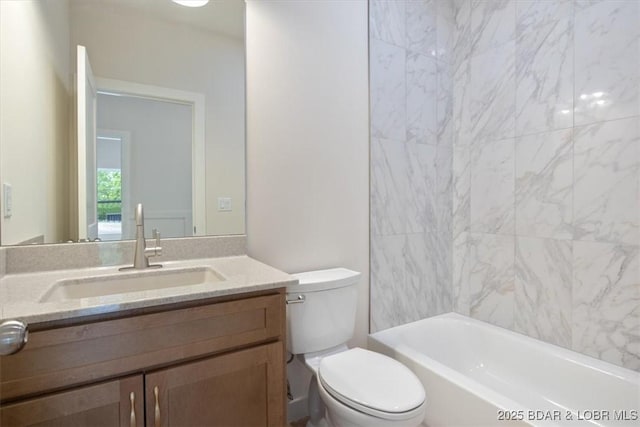full bathroom with toilet, vanity, and shower / washtub combination
