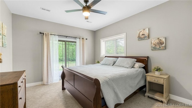 484 Hogan Dr, Lake Ozark, MO 65049 - bedroom featuring access to exterior, light carpet, baseboards, and a ceiling fan
