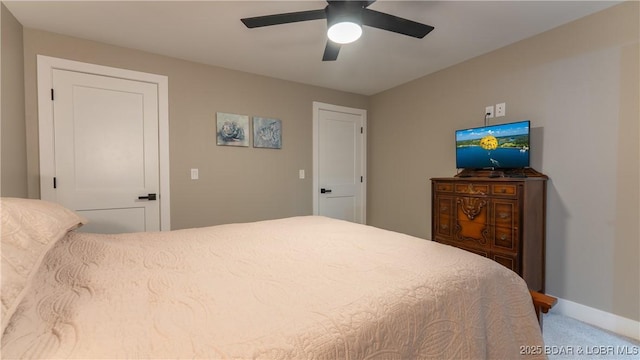 484 Hogan Dr, Lake Ozark, MO 65049 - bedroom featuring carpet flooring, baseboards, and a ceiling fan
