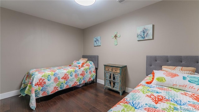 484 Hogan Dr, Lake Ozark, MO 65049 - bedroom featuring baseboards and wood finished floors