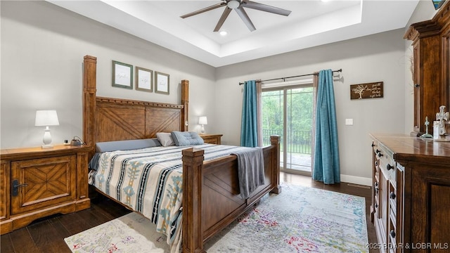 484 Hogan Dr, Lake Ozark, MO 65049 - bedroom featuring access to exterior, a raised ceiling, dark wood-style flooring, recessed lighting, and ceiling fan