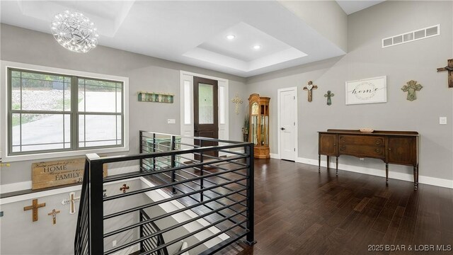 484 Hogan Dr, Lake Ozark, MO 65049 - interior space with a raised ceiling, wood finished floors, baseboards, recessed lighting, and a chandelier