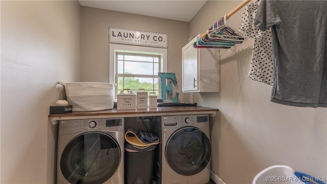 484 Hogan Dr, Lake Ozark, MO 65049 - washroom with washer and clothes dryer and cabinet space