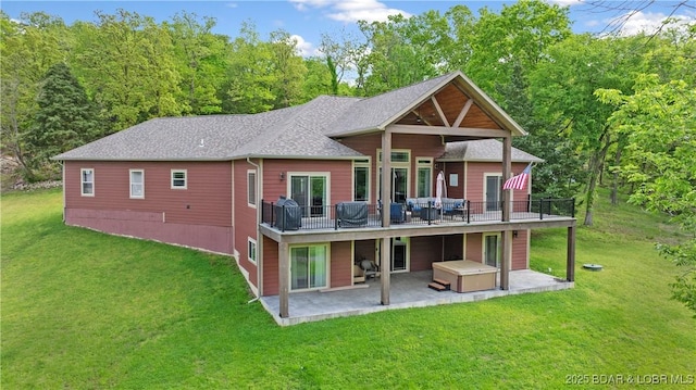 484 Hogan Dr, Lake Ozark, MO 65049 - rear view of property with a patio, a lawn, a wooden deck, and roof with shingles