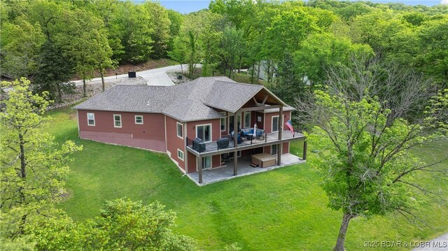484 Hogan Dr, Lake Ozark, MO 65049 - view from above of property featuring a forest