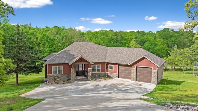 484 Hogan Dr, Lake Ozark, MO 65049 - view of front of property featuring stone siding, a garage, a front yard, and driveway