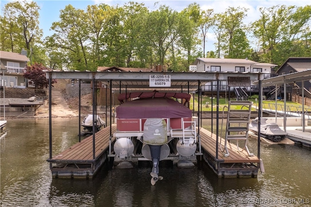 dock with a water view and boat lift