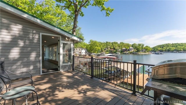 31445 Raytown Dr, Rocky Mount, MO 65072 - deck featuring a dock and a water view