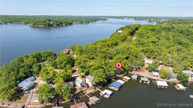 31445 Raytown Dr, Rocky Mount, MO 65072 - aerial view featuring a water view and a wooded view