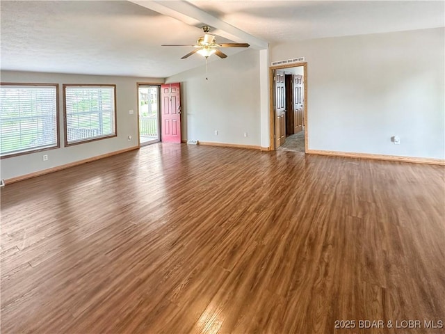 12448 Crestview Dr, Warsaw, MO 65355 - unfurnished living room with baseboards, a ceiling fan, vaulted ceiling with beams, and wood finished floors