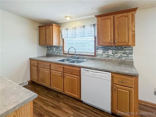 12448 Crestview Dr, Warsaw, MO 65355 - kitchen with dark wood-style flooring, tasteful backsplash, a sink, and dishwasher