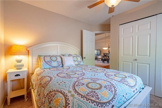 58 Jonathan Dr Unit 4B, Lake Ozark, MO 65049 - bedroom with light colored carpet, a closet, and a ceiling fan