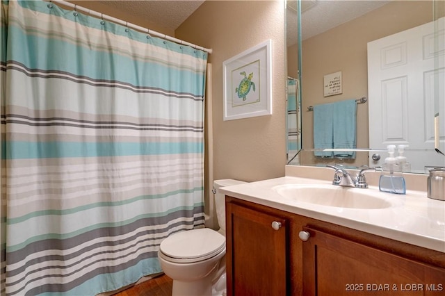58 Jonathan Dr Unit 4B, Lake Ozark, MO 65049 - bathroom featuring toilet, a textured ceiling, vanity, a shower with curtain, and wood finished floors