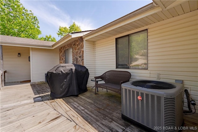 58 Jonathan Dr Unit 4B, Lake Ozark, MO 65049 - wooden terrace with cooling unit and a grill