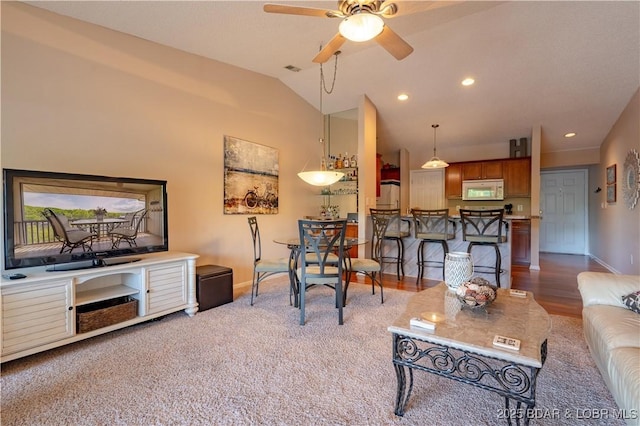 58 Jonathan Dr Unit 4B, Lake Ozark, MO 65049 - living room with baseboards, a ceiling fan, lofted ceiling, recessed lighting, and carpet floors