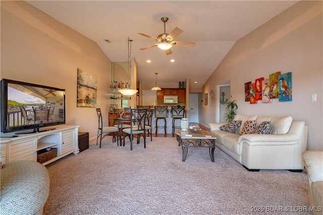 58 Jonathan Dr Unit 4B, Lake Ozark, MO 65049 - living room with lofted ceiling, carpet flooring, ceiling fan, and baseboards