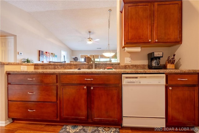 58 Jonathan Dr Unit 4B, Lake Ozark, MO 65049 - kitchen with dishwasher, vaulted ceiling, a sink, wood finished floors, and ceiling fan