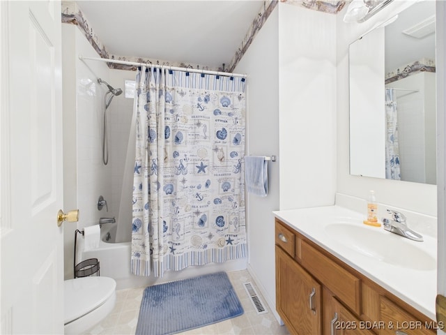 full bathroom featuring shower / bath combo with shower curtain, toilet, and vanity