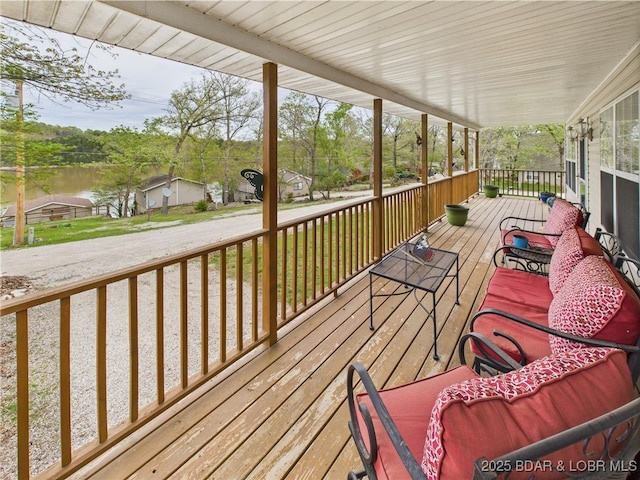 wooden terrace featuring a porch