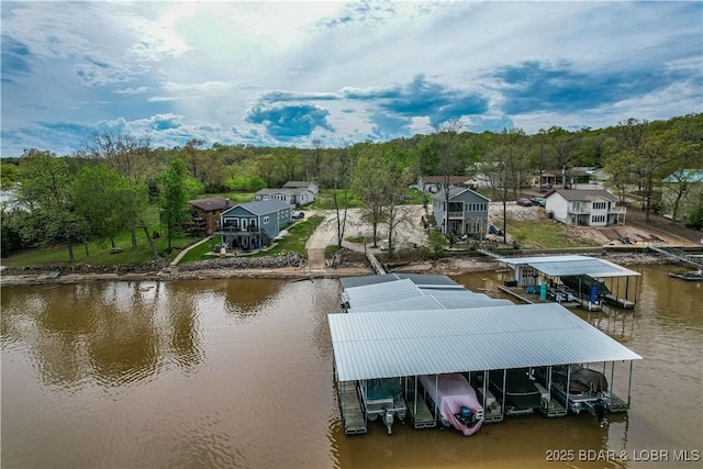 34 Glenmeadows Ct, Linn Creek, MO 65052 - dock area with boat lift and a water view