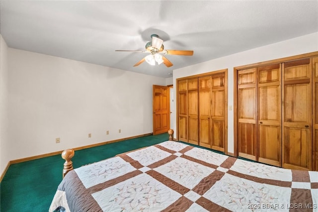 unfurnished bedroom with two closets, baseboards, and a ceiling fan