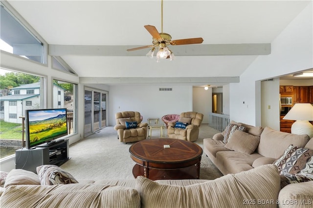 living room with light carpet and a ceiling fan