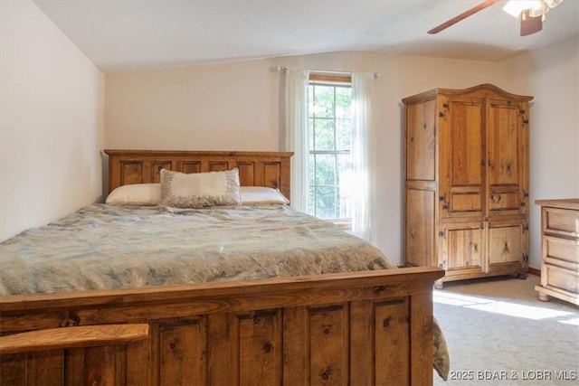 217 Westview Rd, Climax Springs, MO 65324 - bedroom with light carpet, lofted ceiling, and a ceiling fan