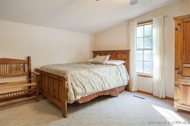 217 Westview Rd, Climax Springs, MO 65324 - bedroom featuring vaulted ceiling, light carpet, ceiling fan, and baseboards