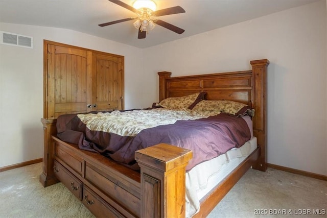 217 Westview Rd, Climax Springs, MO 65324 - bedroom featuring light carpet, baseboards, and ceiling fan