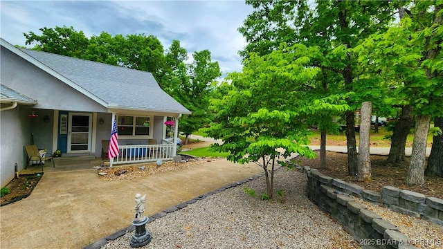 view of yard featuring a porch