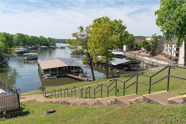 139 Barba Le Ln Unit 2D, Lake Ozark, MO 65049 - dock with a water view and a yard