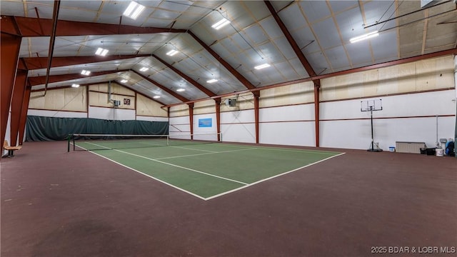 view of tennis court with fence