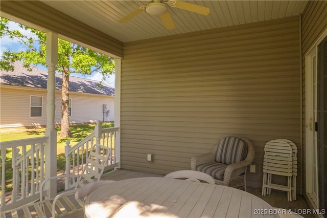 sunroom with a ceiling fan