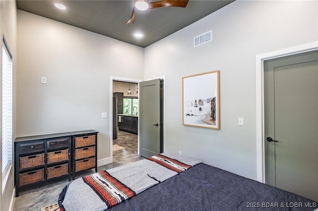 bedroom with a towering ceiling, recessed lighting, and ceiling fan