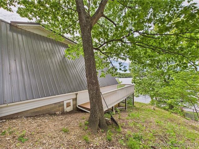 27294 Marina Ln, Barnett, MO 65011 - view of side of property with a deck and metal roof