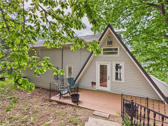 27294 Marina Ln, Barnett, MO 65011 - back of property with a deck, metal roof, and fence