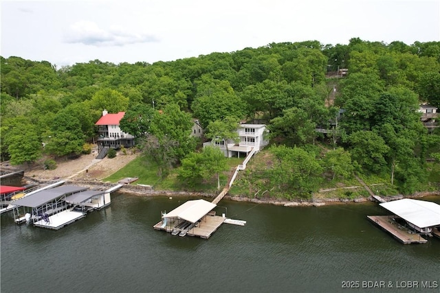 27294 Marina Ln, Barnett, MO 65011 - drone / aerial view of a nearby body of water and a heavily wooded area