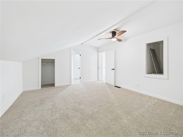 27294 Marina Ln, Barnett, MO 65011 - additional living space with lofted ceiling, carpet flooring, ceiling fan, and baseboards