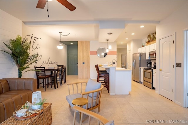 85 Monarch Cove Ln Unit 2C, Lake Ozark, MO 65049 - living room with a ceiling fan, light tile patterned floors, and recessed lighting