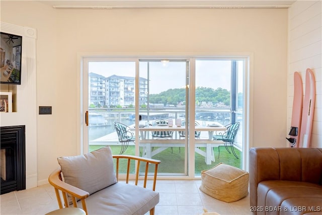 85 Monarch Cove Ln Unit 2C, Lake Ozark, MO 65049 - sitting room featuring tile patterned floors and a fireplace