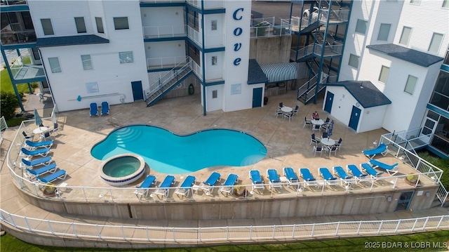 85 Monarch Cove Ln Unit 2C, Lake Ozark, MO 65049 - view of pool featuring a pool with connected hot tub and a patio