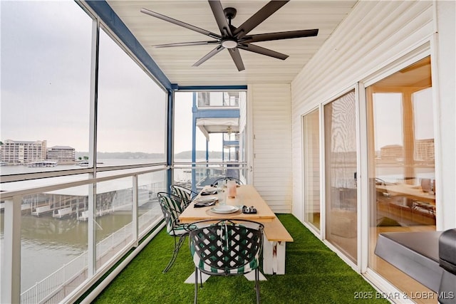 85 Monarch Cove Ln Unit 2C, Lake Ozark, MO 65049 - sunroom / solarium with a ceiling fan and a water view