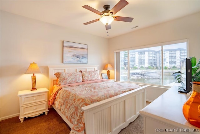 85 Monarch Cove Ln Unit 2C, Lake Ozark, MO 65049 - carpeted bedroom featuring a ceiling fan, baseboards, and access to outside