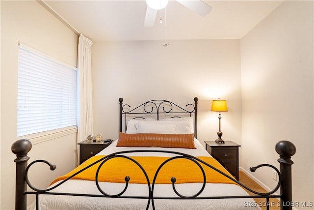 85 Monarch Cove Ln Unit 2C, Lake Ozark, MO 65049 - bedroom with baseboards and ceiling fan